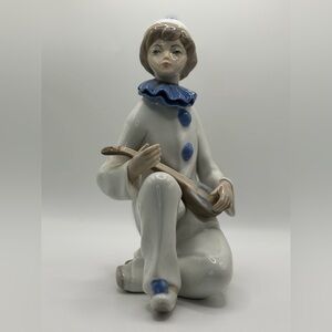 Elegant Porcelain Clown Sculpture with Blue Details